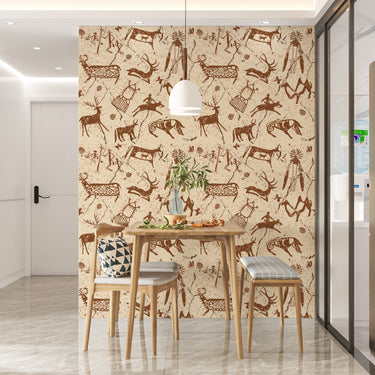 Wallpaper with a beige background, and brown coloured graphics that look like cave Khoisan drawings. Setting is a table and chairs that complement the wallpaper.