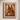 Sankofa The Passage IV framed wall art in black wood frame with stone mount, displayed on a textured warm neutral plaster wall