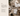 Afro-modern interior design workspace with project boards, materials, and styling elements, illustrating full-service interior design from concept to final execution