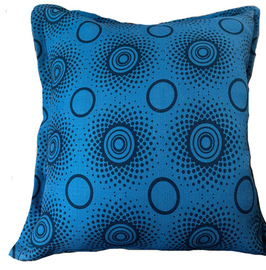Blue pillow with circular pattern on a white background