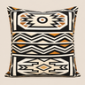 Brown Ndebele-inspired NIZARRA cushion featuring bold Afro-modern geometric patterns in black, cream, white, and ochre tones.