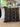 Decorative Mud cloth pillow with black and white pattern on a couch
