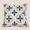 Front product view of a white Basotho-inspired geometric cushion with black and grey patterned motifs.
