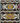 Full NIZARRA Ndebele-inspired wallpaper design showing repeating ochre geometric medallions, ivory zigzag bands and burgundy, blue and terracotta accents on black.