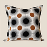 NIZARRA cushion with black halftone dot circles and warm brown circular accents on a cream fabric base, shown as a clean product image on a neutral background.