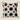 NIZARRA cushion with black halftone dot circles and warm brown circular accents on a cream fabric base, shown as a clean product image on a neutral background.