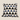 Front product view of a NIZARRA Xhosa-inspired cushion with black, white, grey and cobalt-blue geometric triangle pattern.