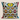 Front view of the NIZARRA Ndebele-inspired cushion featuring bold black-and-white zigzags with yellow, blue, orange and pink accents.