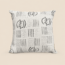 Cream rectangular mud cloth-inspired cushion with black hand-drawn linear marks, dotted patterns, and circular motifs on a warm neutral background.
