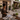 NIZARRA Interior designer reviewing exterior finish and colour samples at the entrance of a contemporary home.