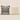 Two square throw pillows on a solid beige background. The left pillow features a Ndebele geometric pattern in black, cream, and ochre orange.Ndebele-print cushion cover in black, cream and ochre displayed beside a cream ribbed faux-fur cushion cover.