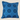 Front view of a square sky-blue NIZARRA cushion featuring dark blue circular and dotted Setswana-inspired motifs.