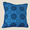 Front view of a square sky-blue NIZARRA cushion featuring dark blue circular and dotted Setswana-inspired motifs.